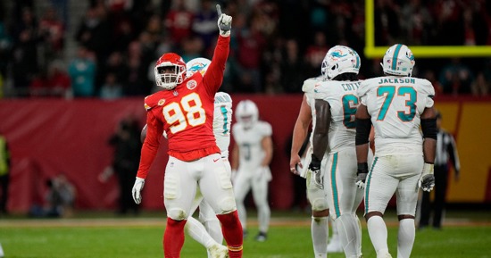 Kansas City Chiefs defensive tackle Tershawn Wharton (98) celebrates after sacking Miami Dolphins quarterback Tua Tagovailoa for an 11-yard loss during the second half of an NFL football game Sunday, Nov. 5, 2023, in Frankfurt, Germany. (AP Photo/Martin Meissner)