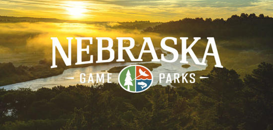 Nebraska Game and Parks Logo With a senery of a river and a sunrise in the background.